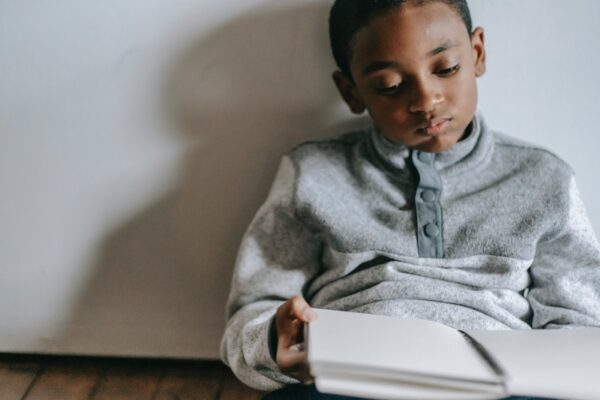 boy reading frustrated