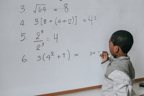 boy math at the board