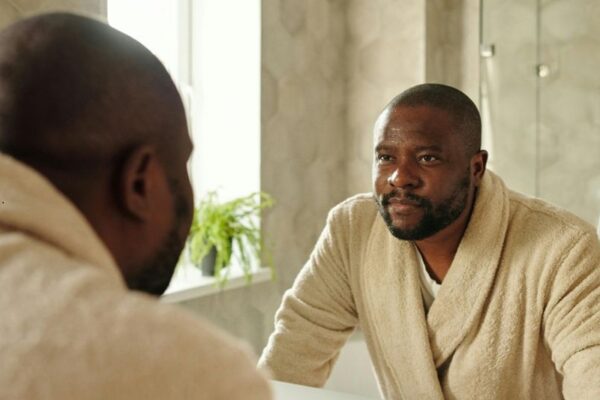 Black man in mirror